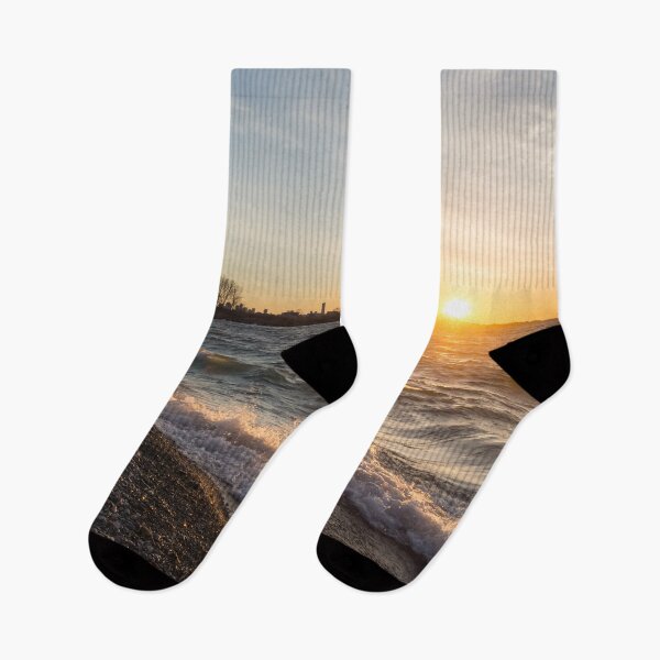 Item preview, Wave Splash Sunrise - Toronto Skyline Behind Rough Lake Ontario designed and sold by Georgia Mizuleva.
