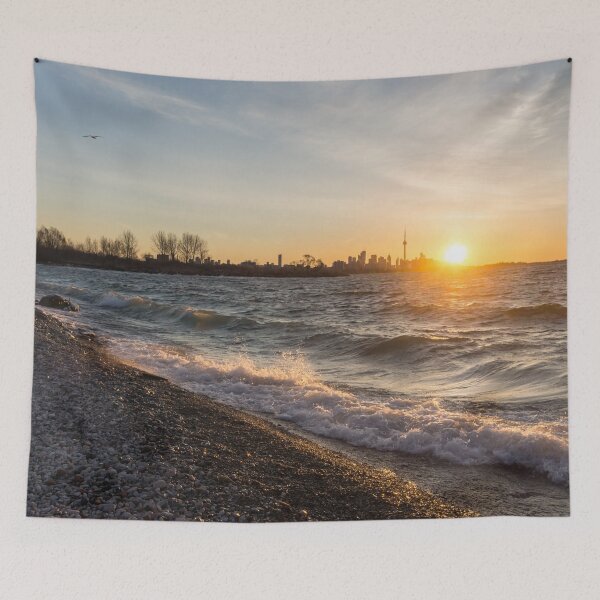 Item preview, Wave Splash Sunrise - Toronto Skyline Behind Rough Lake Ontario designed and sold by Georgia Mizuleva.