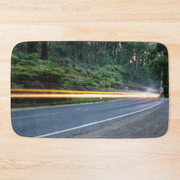 Item preview, Car lights streaking past on a quiet country road in the Australian rainforest designed and sold by James-Cole.