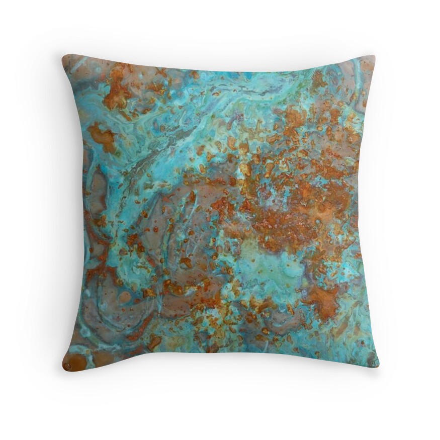 teal colored throw pillows        
        <figure class=