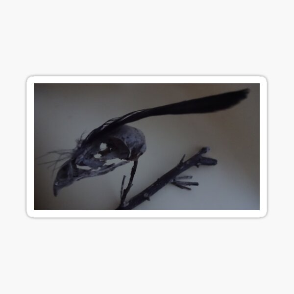 Last dead bird skull burning with a black flame feather Sticker