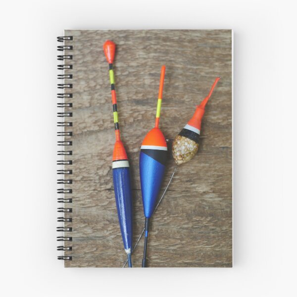 Item preview, three fishing bobbers on wooden background designed and sold by mrivserg.