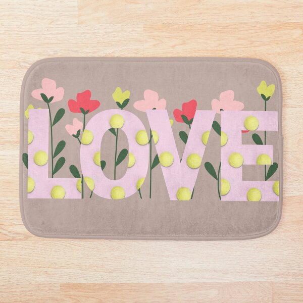 Pink Love Tennis Ball Print Wording with Flowers in the Background Bath Mat