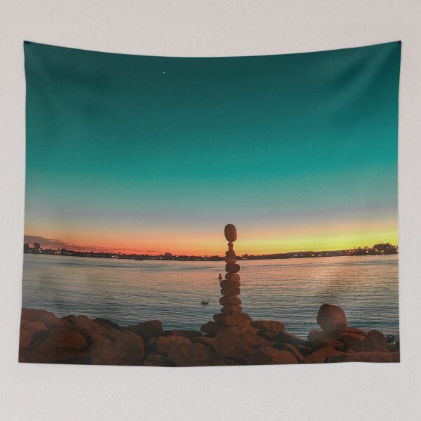 Item preview, Orange ocean Sunset with balanced rocks designed and sold by Happiness Creators.