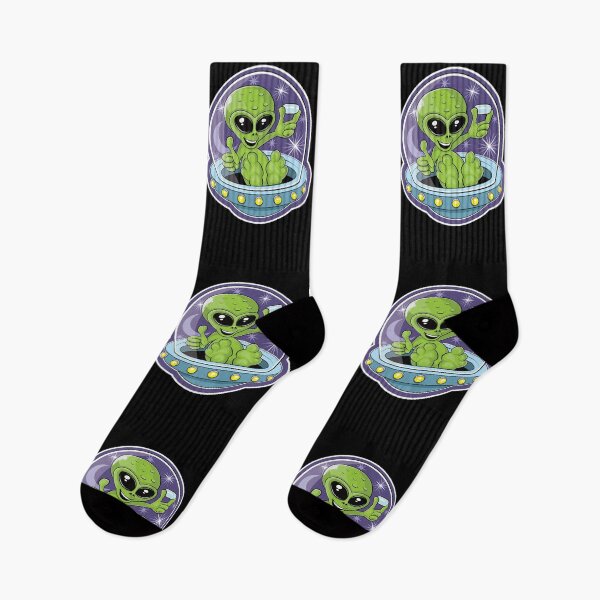 Item preview, Illustration of a cute alien holding candy in a flying saucer designed and sold by robimerch.