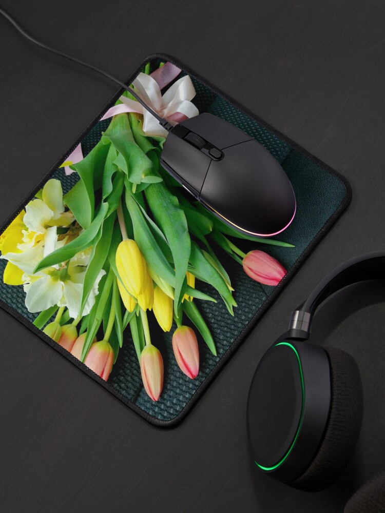 Alternate view of Bouquet of multicolored tulips, on the seat of a car, tied with a pink bow Mouse Pad