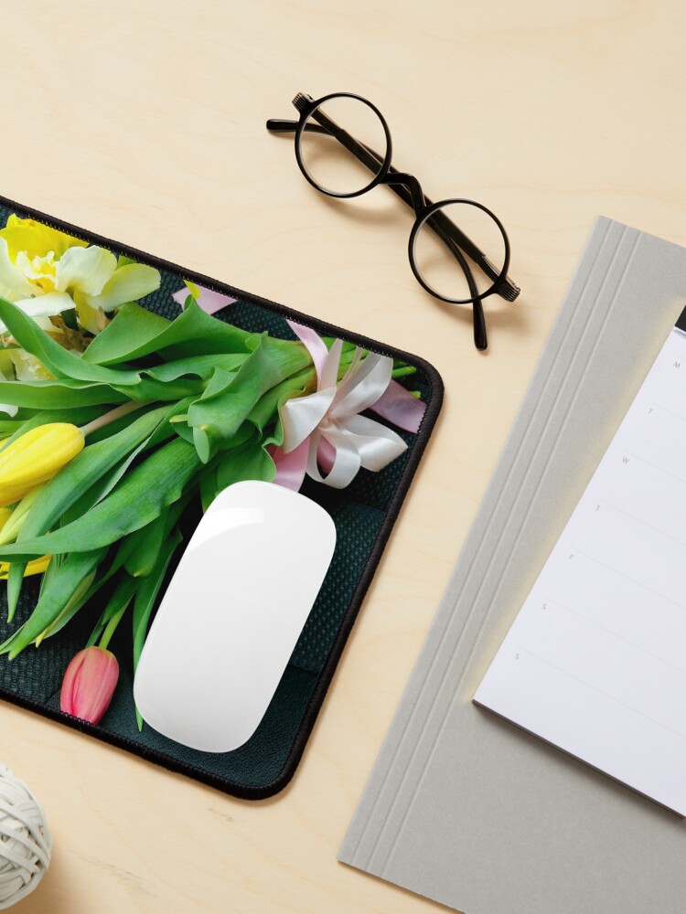 Alternate view of Bouquet of multicolored tulips, on the seat of a car, tied with a pink bow Mouse Pad