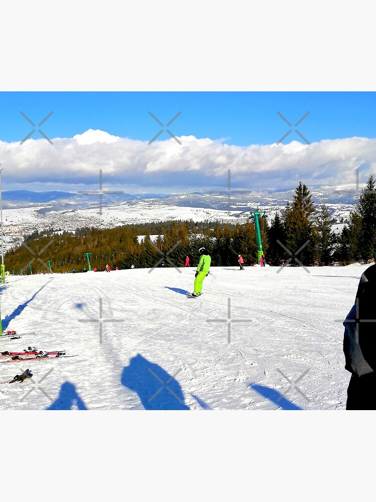 Landscape on the ski slope, sunny day, people feeling good, mountains in the distance, beautiful clouds in the sky by CWartDesign