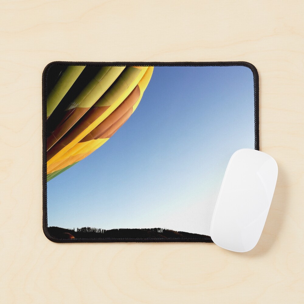Colorful hot air balloon rising, sky without clouds, wonderful landscape Mouse Pad
