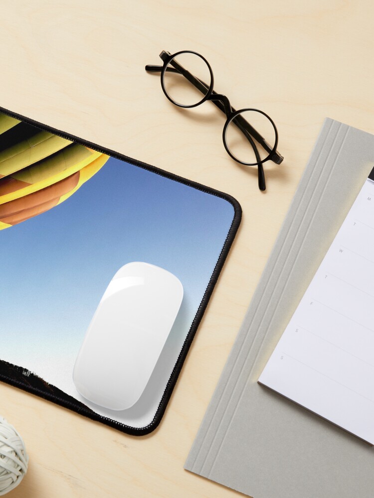 Alternate view of Colorful hot air balloon rising, sky without clouds, wonderful landscape Mouse Pad