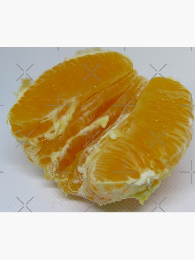 Half of orange fruit with juice drop dripping white paper by CWartDesign