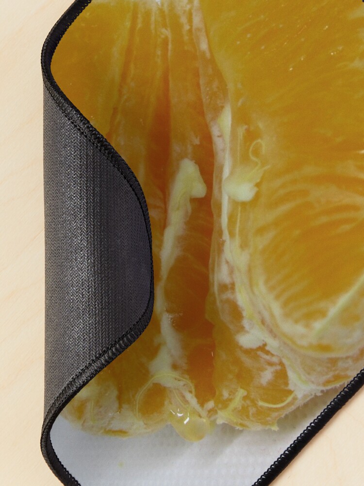 Alternate view of Half of orange fruit with juice drop dripping white paper Mouse Pad