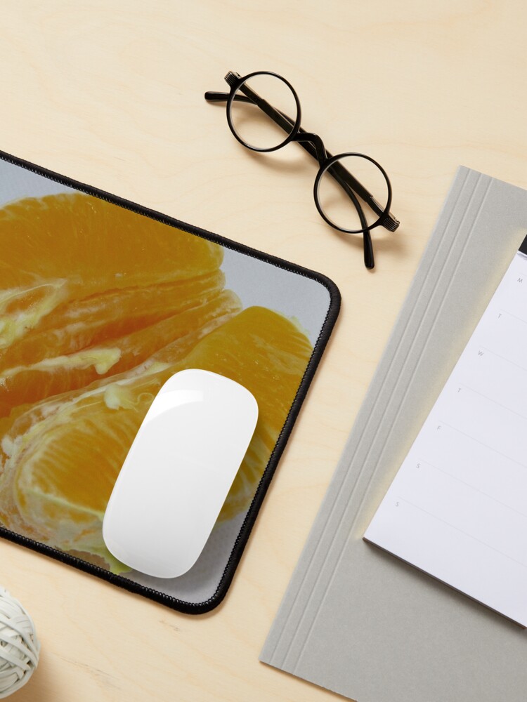 Alternate view of Half of orange fruit with juice drop dripping white paper Mouse Pad
