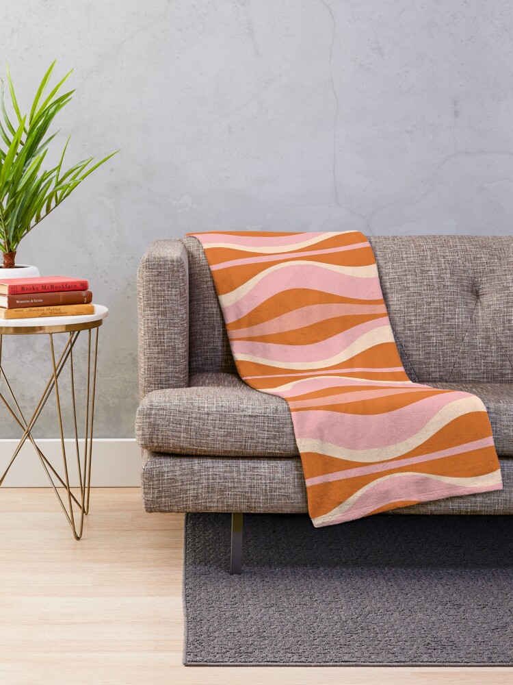 Orange and 2025 cream throw blanket