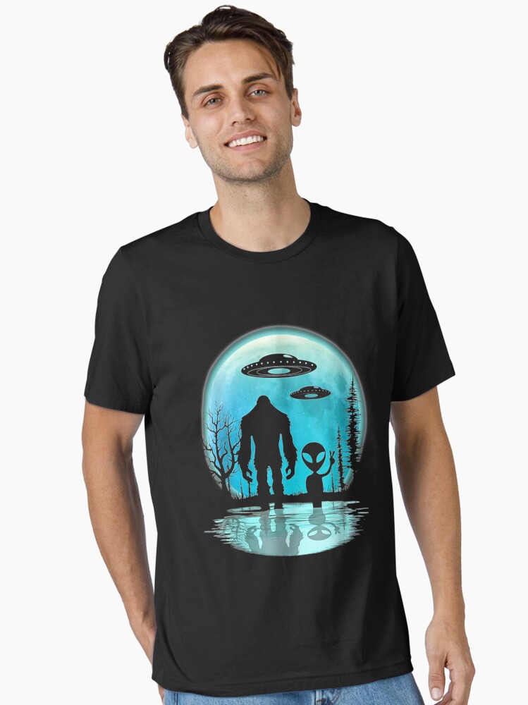 Thumbnail 1 of 7, Essential T-Shirt, Alien And Bigfoot designed and sold by JayneAva.