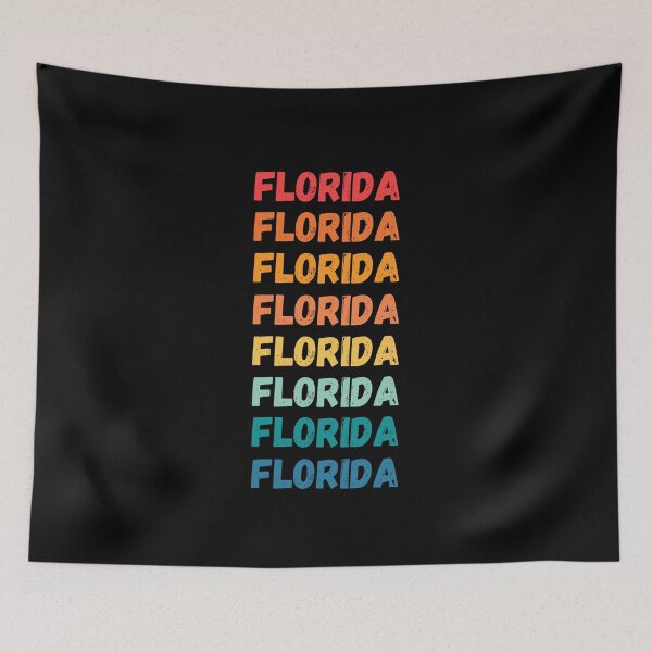 Item preview, FLORIDA - repeated retro vintage sunset colors with a distressed design effect Graphic T-Shirt | Essential T-shirt designed and sold by printdot.