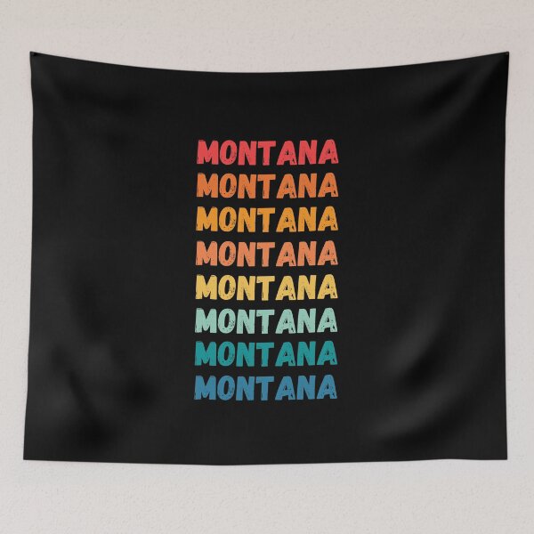 Item preview, MONTANA - repeated retro vintage sunset colors with a distressed design effect Graphic T-Shirt | Essential T-shirt designed and sold by printdot.