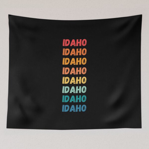 Artikelvorschau, IDAHO - herhaalde retro vintage zonsondergangkleuren met een verontrust ontwerpeffect Grafisch T-shirt | Essentieel T-shirt entworfen und verkauft von printdot.