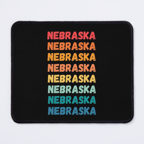 Item preview, NEBRASKA - repeated retro vintage sunset colors with a distressed design effect Graphic T-Shirt | Essential T-shirt designed and sold by printdot.