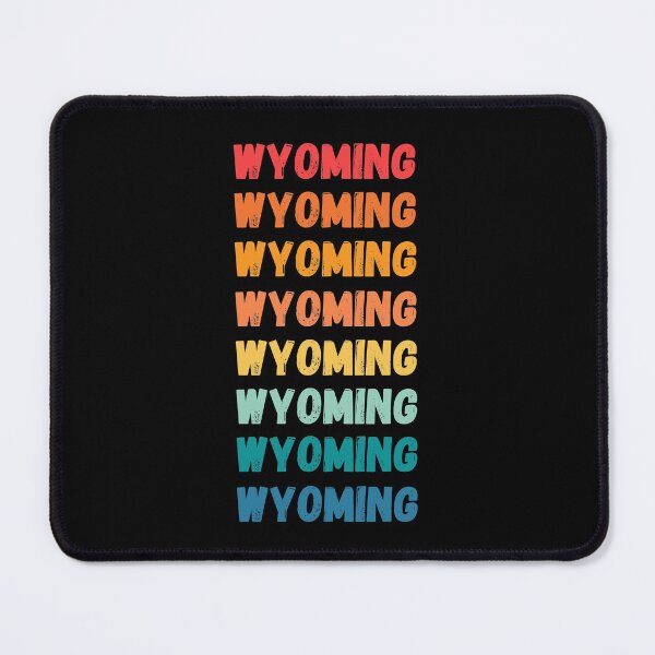 Item preview, WYOMING - repeated retro vintage sunset colors with a distressed design effect Graphic T-Shirt | Essential T-shirt designed and sold by printdot.