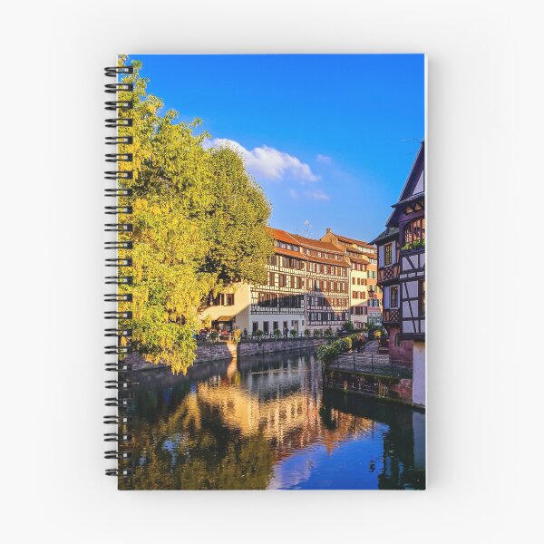 Item preview, Old center of Strasbourg. Typical alsacien houses on the river. Vivid colors on sunset. Touristic concept. designed and sold by Alexander Sorokopud.