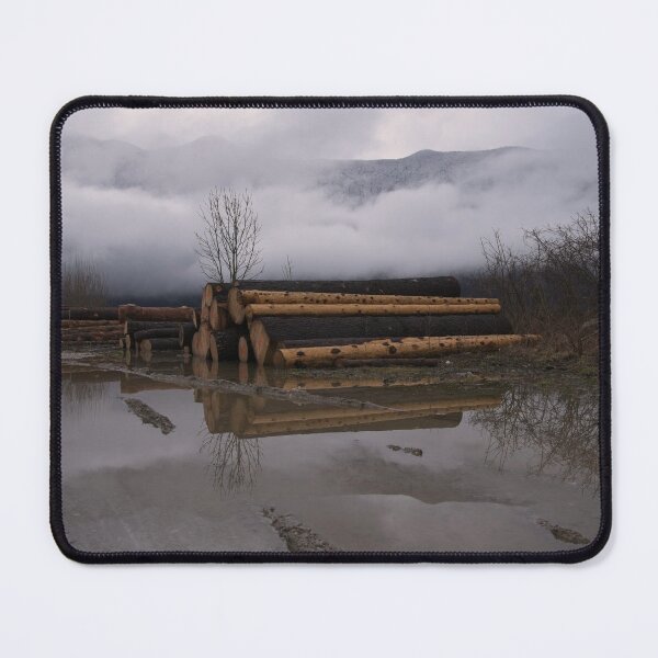 Item preview, Timber Logs With A Foggy Mountain View designed and sold by rawshutterbug.