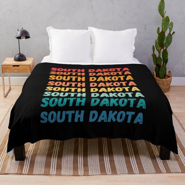 Item preview, SOUTH DAKOTA  - repeated retro vintage sunset colors with a distressed design effect Graphic T-Shirt | Essential T-shirt designed and sold by printdot.