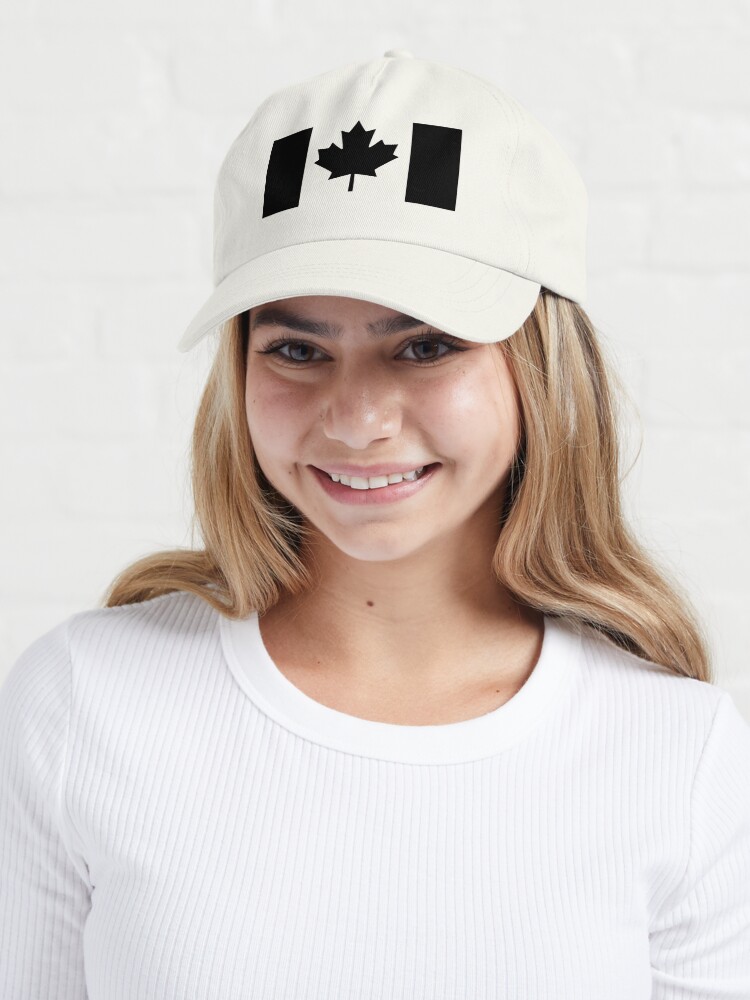 Imagen 6 de 7, Gorra con la obra Una versión con la bandera canadiense negra, diseñada y vendida por Garaga.