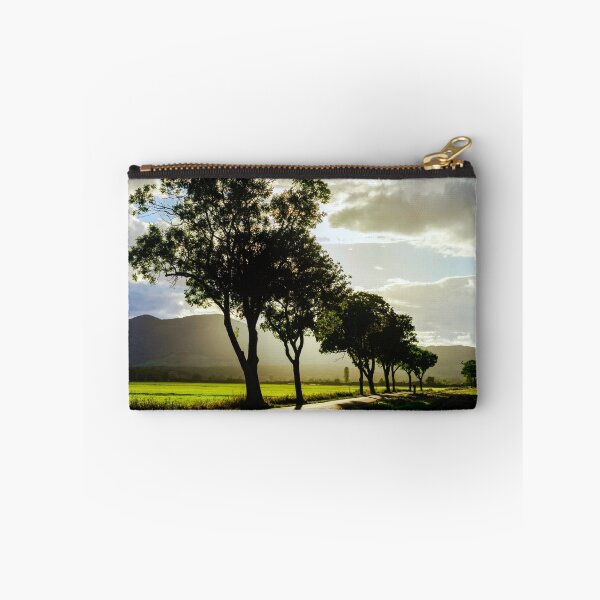 Item preview, Beautiful sunset through the trees, empty way in the fields of Alsace, Frabce, with mountains on background designed and sold by Alexander Sorokopud.