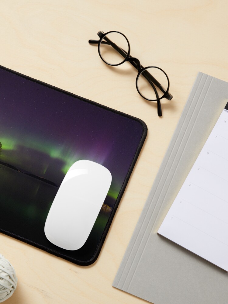 Alternate view of Northern lights glowing over lake in Finland Mouse Pad