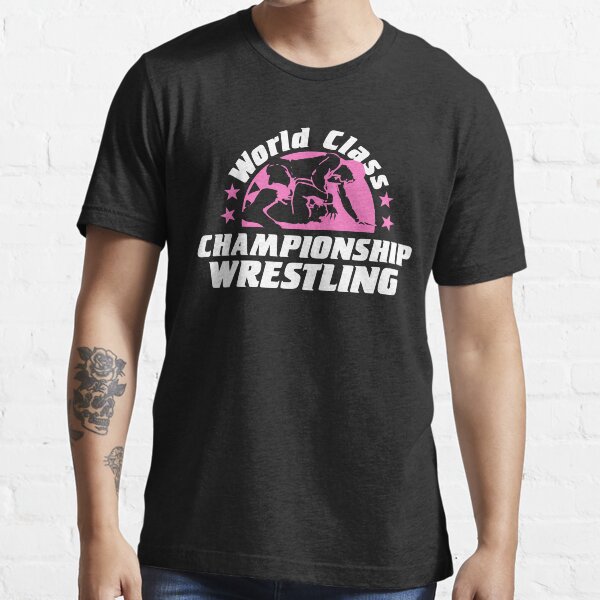 World class championship wrestling logo breast cancer awareness Essential T-Shirt