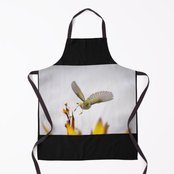 Item preview, bird in flight heading towards camera with wings outstretched above flowers just feeding on. designed and sold by Brian Scantlebury.