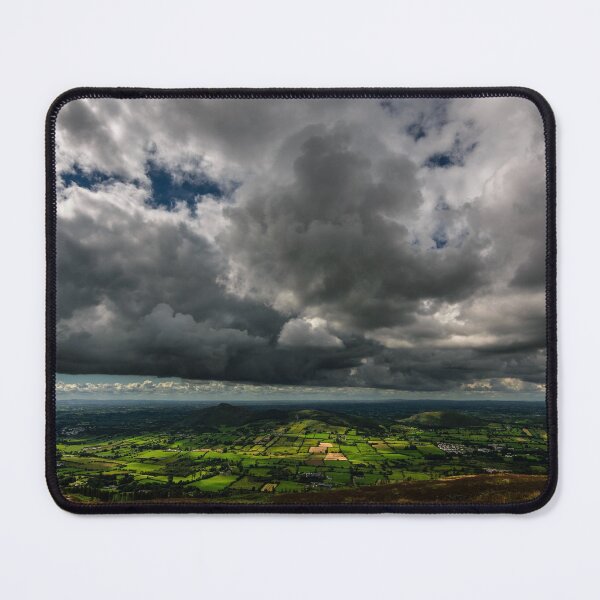 Item preview, Storm in the sky, sunshine and rain under the clouds, view from top of the mountain Slieve Gullion in the south of County Armagh, Northern Ireland designed and sold by AlbertMi.