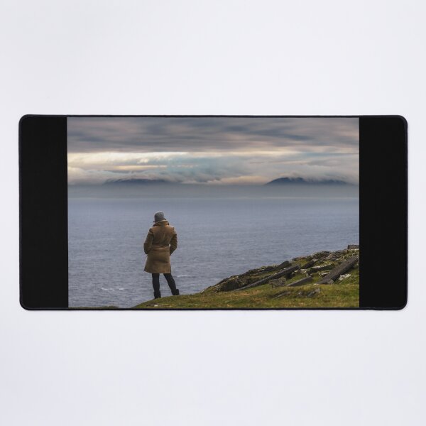 Item preview, Woman enjoying view of ocean with mountains and beautiful cloudscape, from Slieve League mountain on the Atlantic coast of County Donegal, Ireland designed and sold by AlbertMi.