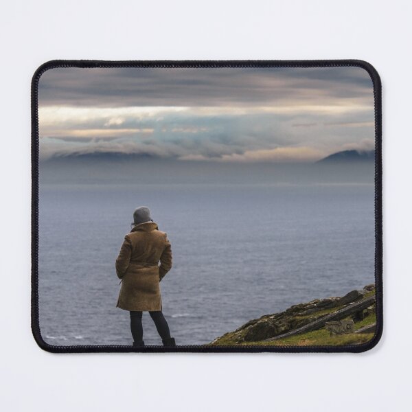 Item preview, Woman enjoying view of ocean with mountains and beautiful cloudscape, from Slieve League mountain on the Atlantic coast of County Donegal, Ireland designed and sold by AlbertMi.