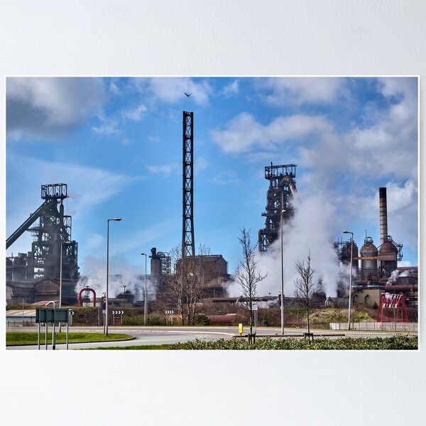 Factory Tata Steel with smoking chimneys on a sunny day, IJmuiden, The  Netherlands Stock Photo