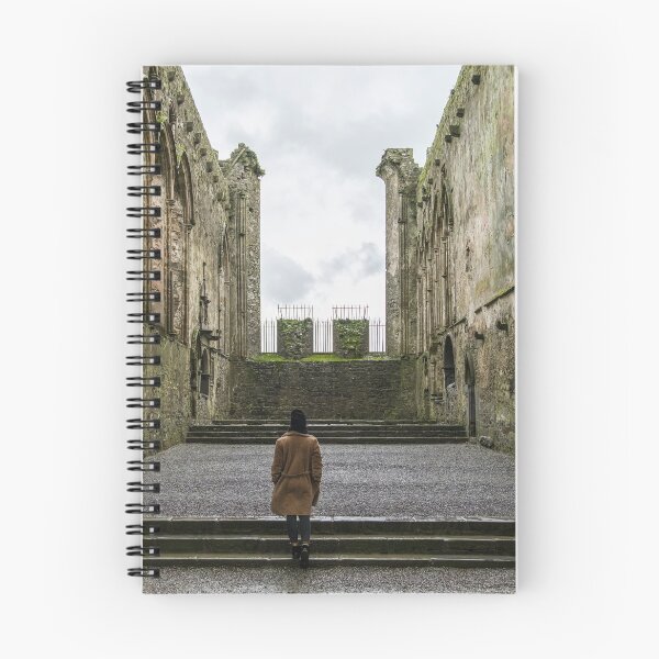 Item preview, A woman exploring the interior of The Rock of Cashel, also known as Cashel of the Kings and St. Patrick's Rock, is a historic site located at Cashel, County Tipperary, Ireland designed and sold by AlbertMi.