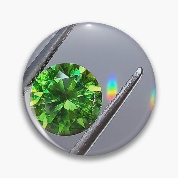 Item preview, rainbow green garnet gemstone in tweezers designed and sold by QueenofCarbon.