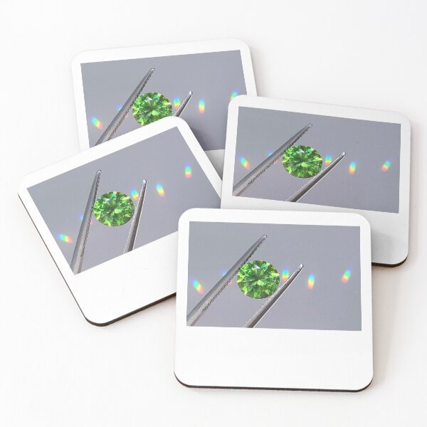 Item preview, rainbow green garnet gemstone in tweezers designed and sold by QueenofCarbon.