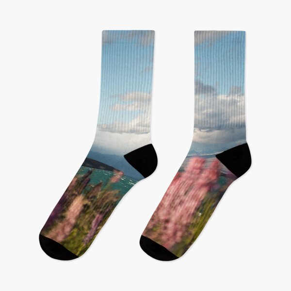 Item preview, Turquoise Lake with Lupin Flowers in a Bloom Surrounded by Mountains designed and sold by Danny Wanders.