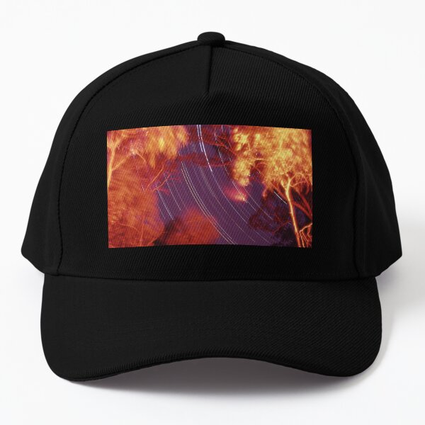 Star trails with 'flaming' trees Baseball Cap