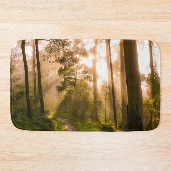 Item preview, Godrays from the golden sunrise shine through the misty forest trees designed and sold by James-Cole.