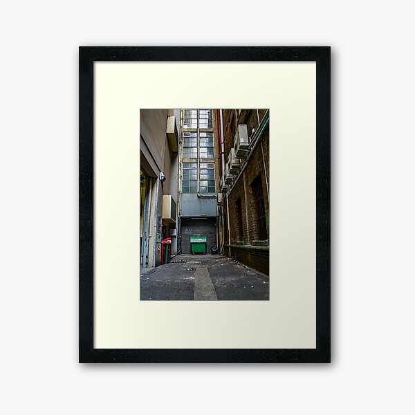 End of a city laneway lined with windows and air conditioners Framed Art Print