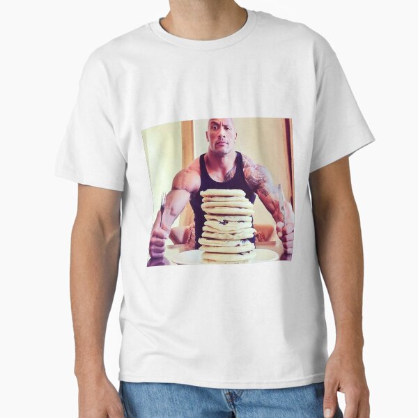 Aperçu de l'œuvre Dwayne The Rock Johnson mangeant des crêpes aux bleuets créée et vendue par ThadCox.