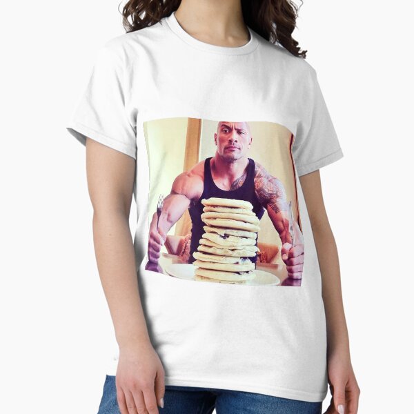 Vista previa del artículo con la obra «Dwayne The Rock Johnson comiendo panqueques de arándanos», diseñado y vendido por ThadCox.