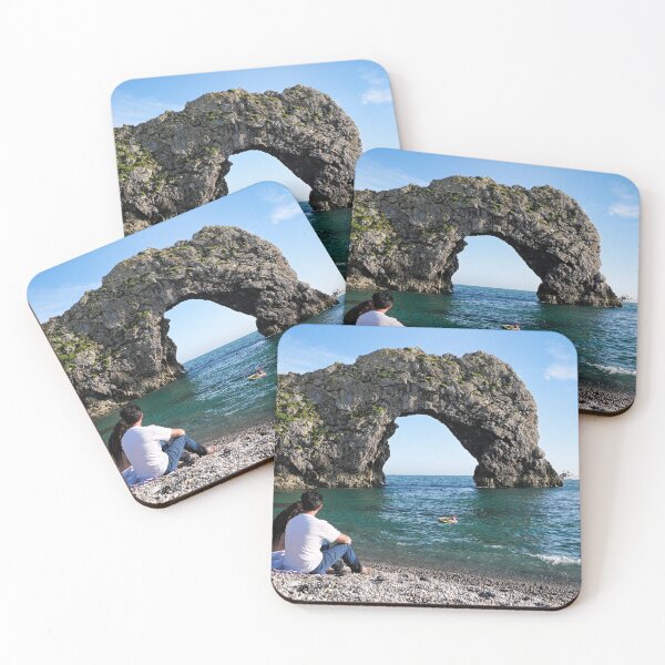 Item preview, Couple sitting near Durdle door  designed and sold by santoshputhran.