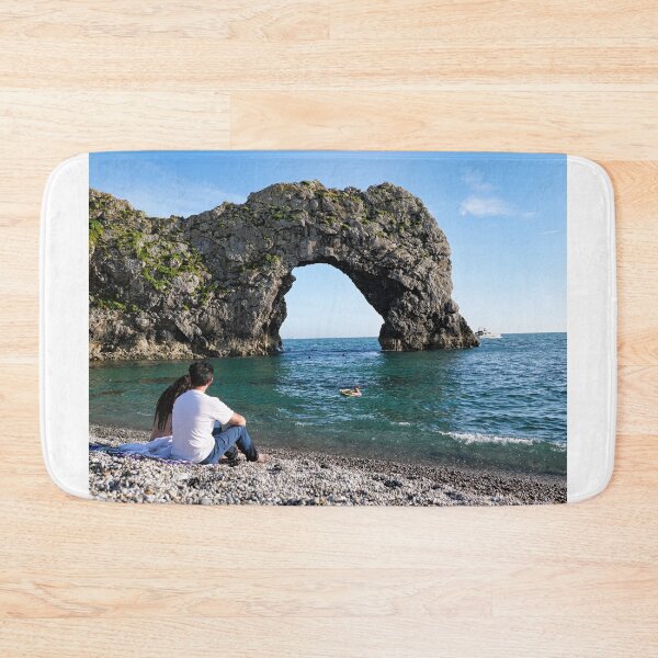 Item preview, Couple sitting near Durdle door  designed and sold by santoshputhran.