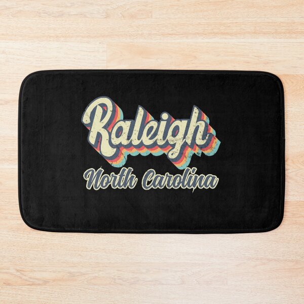 Item preview, Raleigh City North Carolina Retro Vintage 70s rainbow designed and sold by Teelogic.