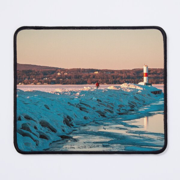 Item preview, Lone visitor to the frozen lighthouse in Petoskey Michigan designed and sold by Michael Deemer.