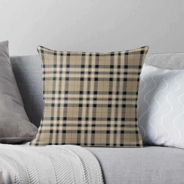 Black and store tan plaid pillows